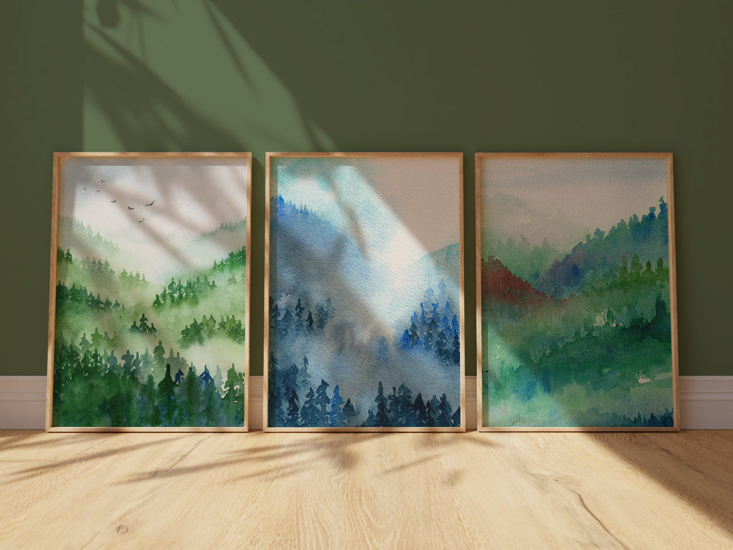 A trio of framed watercolour landscapes